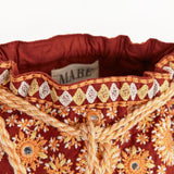 Suri Emb Pouch Handbag - Rust
